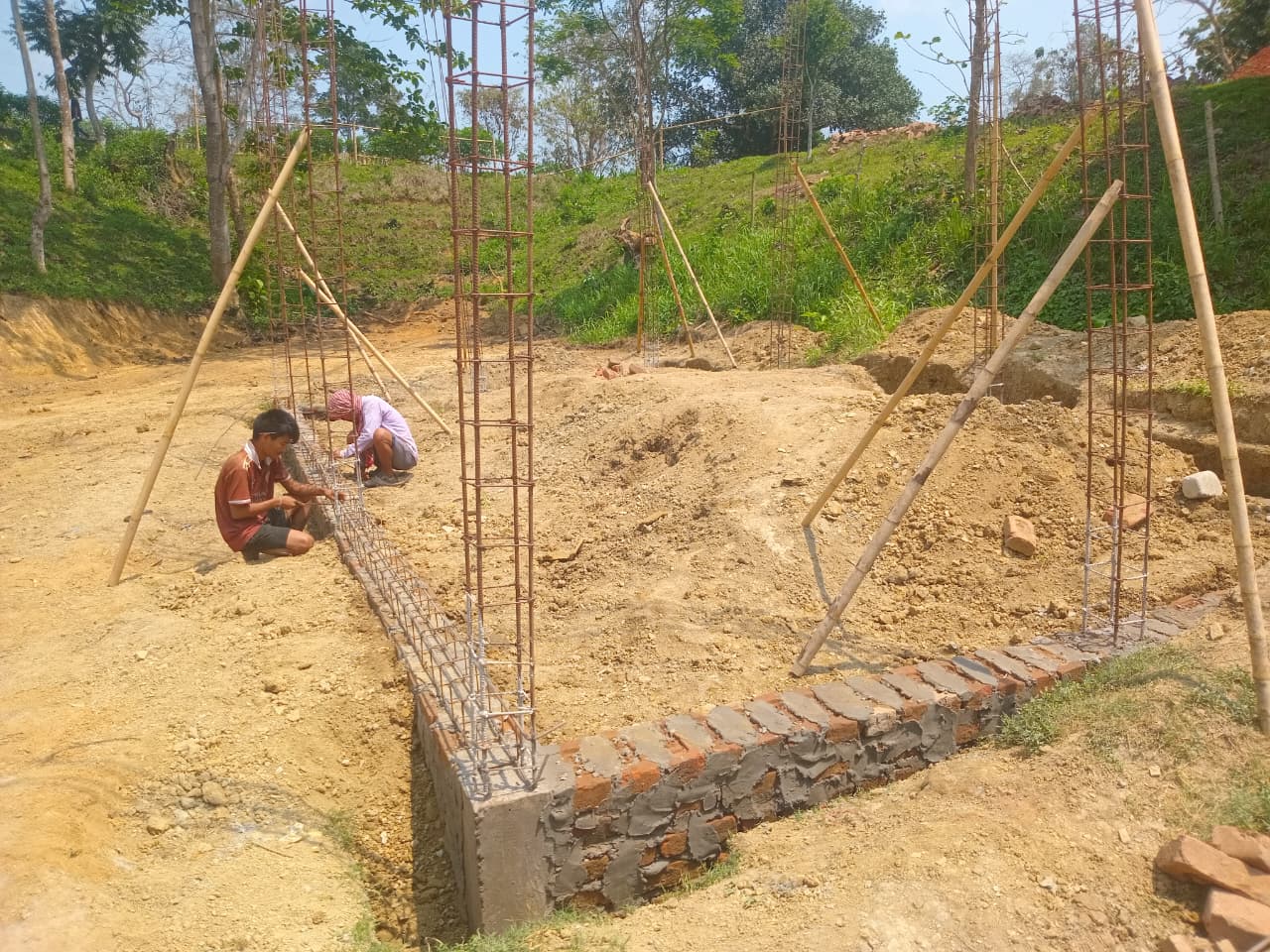 BVNS Boys Hostel foundation rebar and brickwork