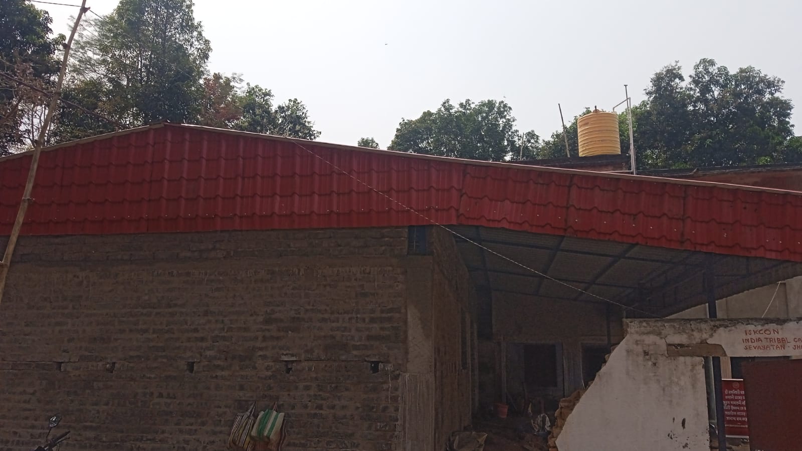 Prayer hall side view with ISKCON ITCT Sevayatana sign