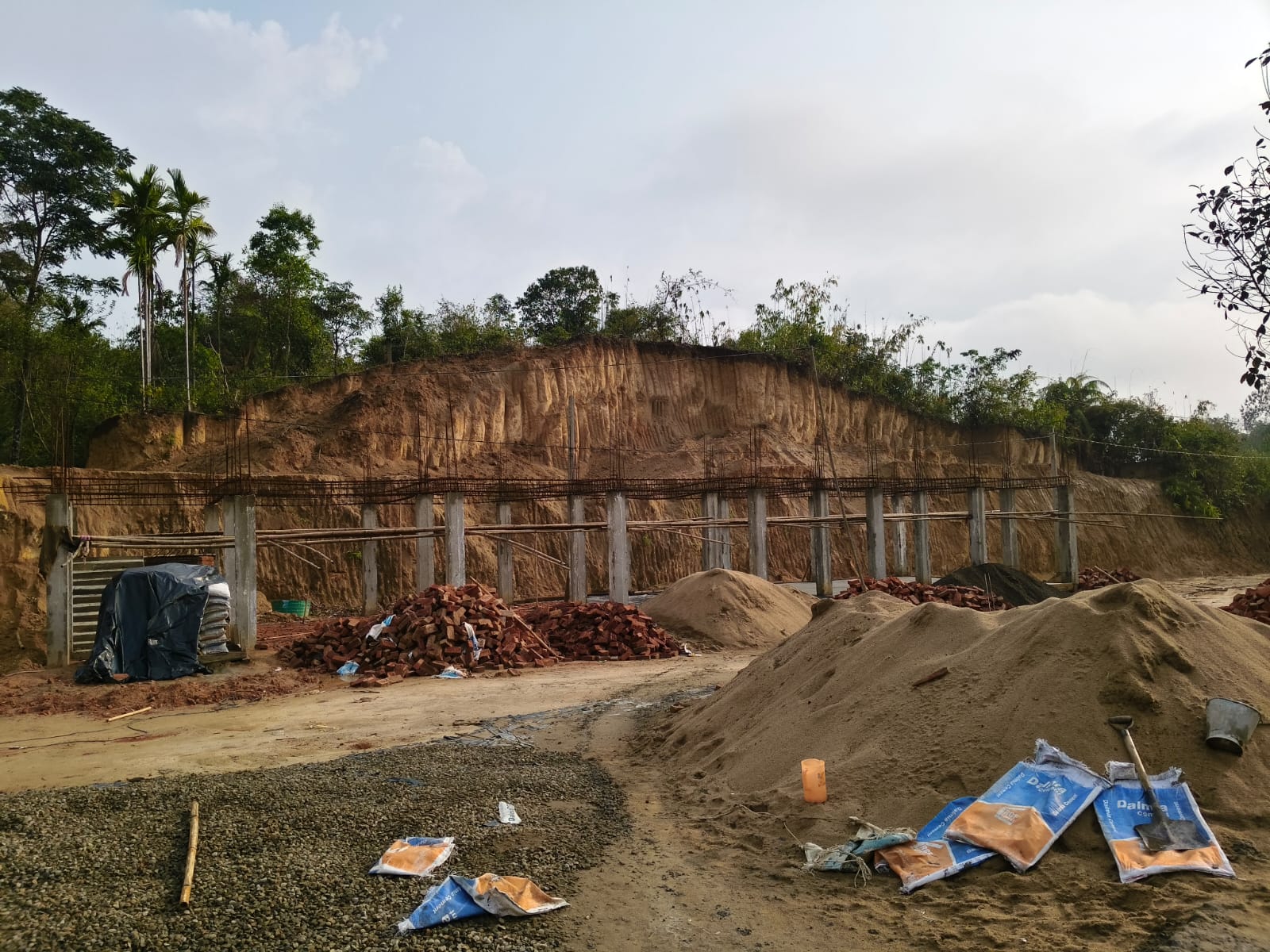 School construction site at Kathlichera — retaining wall and pillars
