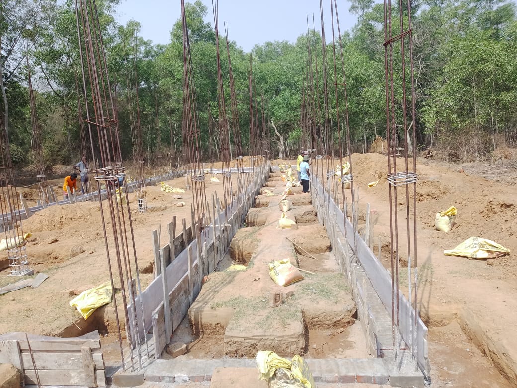School construction at Mada Pada — wide view of formwork and pillar framework
